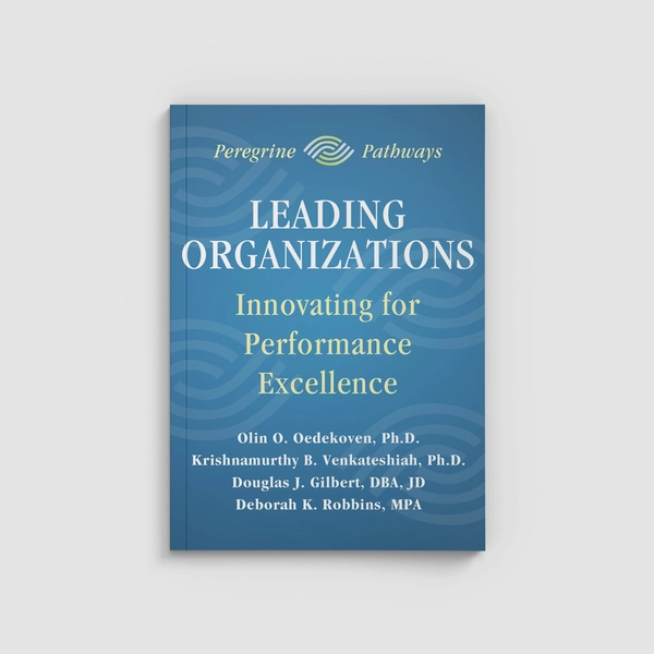 A blue book title Leading Organizations on a white surface