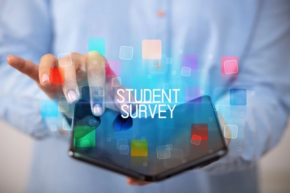 Hands holding a phone. There is a graphic illustration of squares hovering over the screen with text that says, "Student Survey"