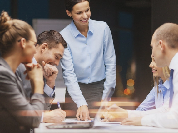 A supervisor leading a meeting.